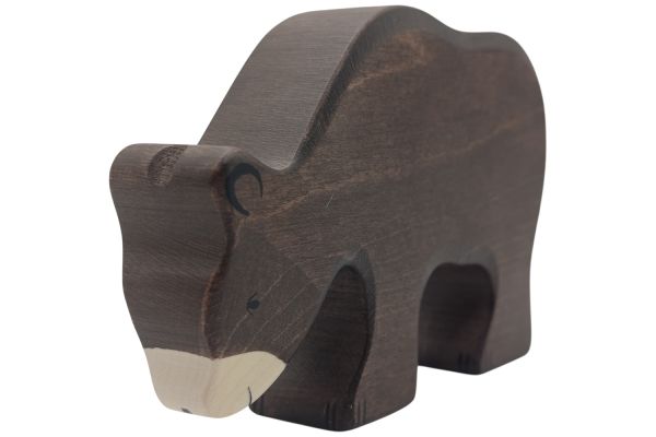 Holztiger Braunbär fressend